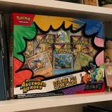 Pokemon Ascended Heroes First Partners Deluxe Pin Collection auf einem Regal – sammlersicher verpackt von CardsRfun