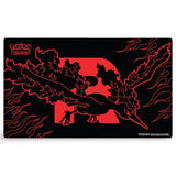 Team Rocket's Moltres ex Playmat – Moltres-Silhouette und Team-Rocket-R auf schwarzem Hintergrund